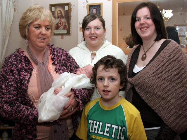Baby Megan pictured with granny Madeline, aunts Subrina, Gemma and uncle David 0048JML : Parties and celebrations March 2006: Megan Ann Eileen Smith.