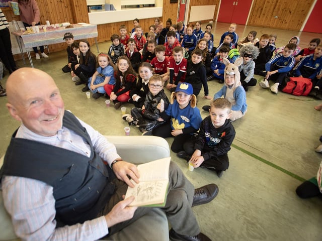 Mr. Philip O'Neill from the Culmore Community Hub, who read to the pupils during World Book Day on Thursday at Hollybush PS.