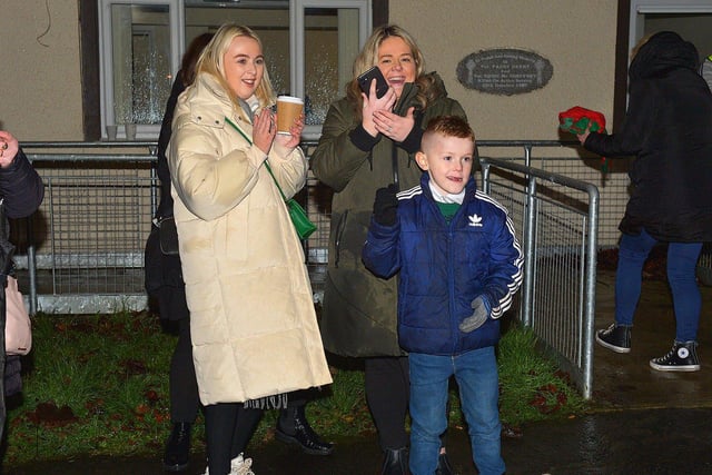 People gather to greet Santa at the Creggan Community Collective, Cromore Gardens, on Friday evening last. DER2249GS – 30
