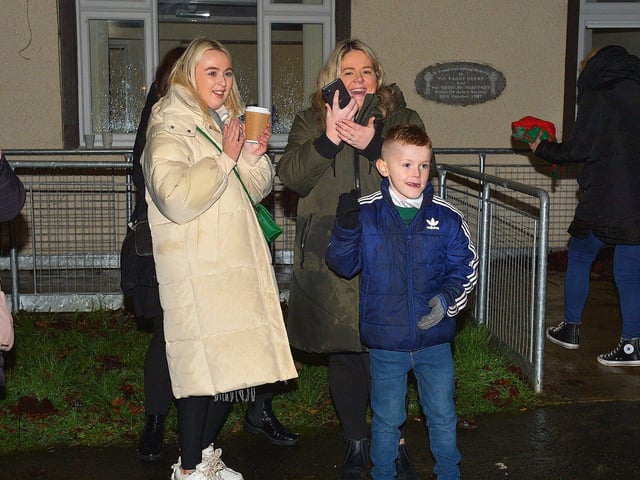 People gather to greet Santa at the Creggan Community Collective, Cromore Gardens, on Friday evening last. DER2249GS – 30