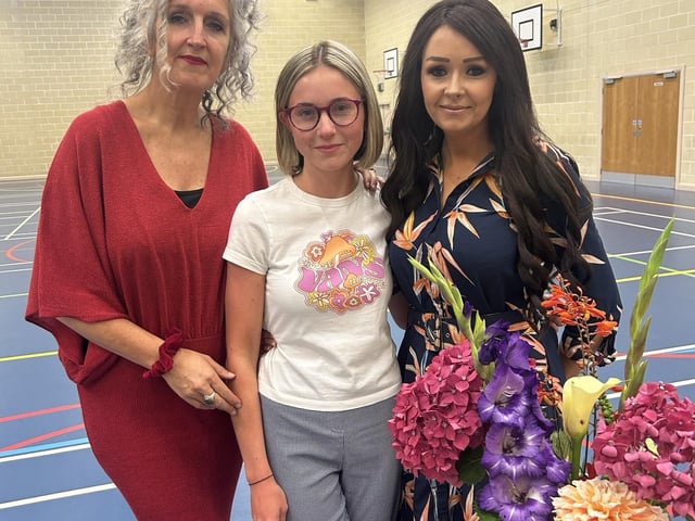 Ellen Devine being congratulated on her wonderful A Level results by Ms Mallett (Principal) and Mrs Byrne (Senior Teacher).