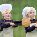 Pupils at Gaelscoil Eadain Mhoir flipping pancakes in 2012.