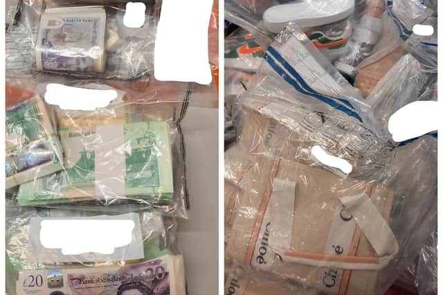 The cash and suspected counterfeit goods seized by the PSNI