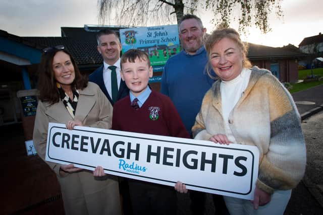 CREEVAGH HEIGHTS. . . .The winner of the Radius ‘Name The Development’  at Creggan Heights, Derry - Master Jack Taylor, St. John’s PS, pictured on Friday last at his school. Included is Bridie Doherty, Area Housing Manager, Radius, Andrew Lennon, Development Officer, Radius, Raymond McCann, Contracts Manager, P. & K. McKaigue (Building Contractors) and Mrs. Geraldine O’Connor, Principal, St. John’s Primary School, Derry.