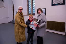 Rev Canon Judi McGaffin, Oran Culligan, Lorraine Hill look forward to the 'Spark to A Flame' flower festival in Buncrana.