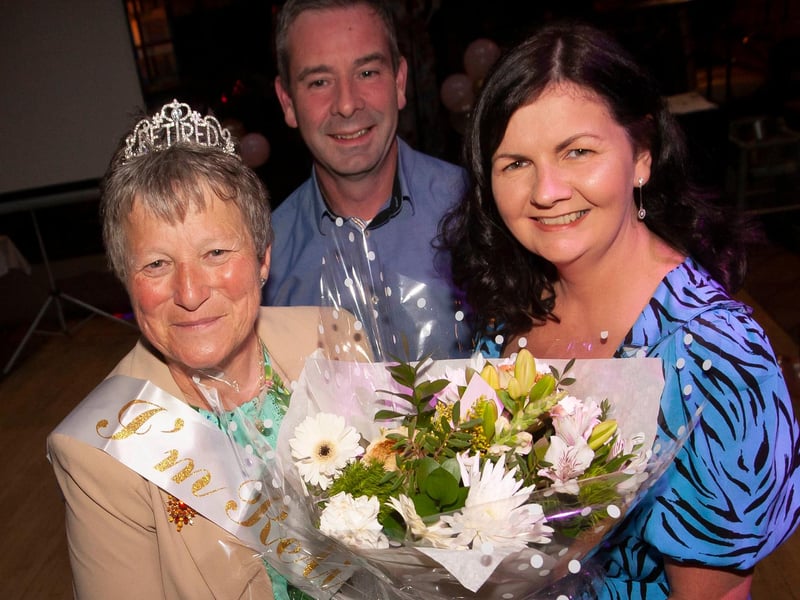 Retiring teacher Linda Heaney receiving a bouquet of flowers from Mrs. Agnes Coyle, School Secretary at Da Vinci's Hotel on the occasion of her retirement. Back centre is Mr. Sean McLaughlin, Principal. (Photos: JIm McCafferty Photography)