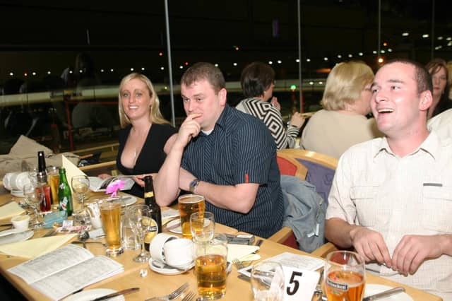 Enjoying a night out at the Lifford Greyhound Stadium in October 2004.
