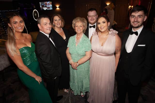 Stephen Twells, chair, Foyle Search and Rescue, pictured on Saturday night with members of his family at the Gala Ball.