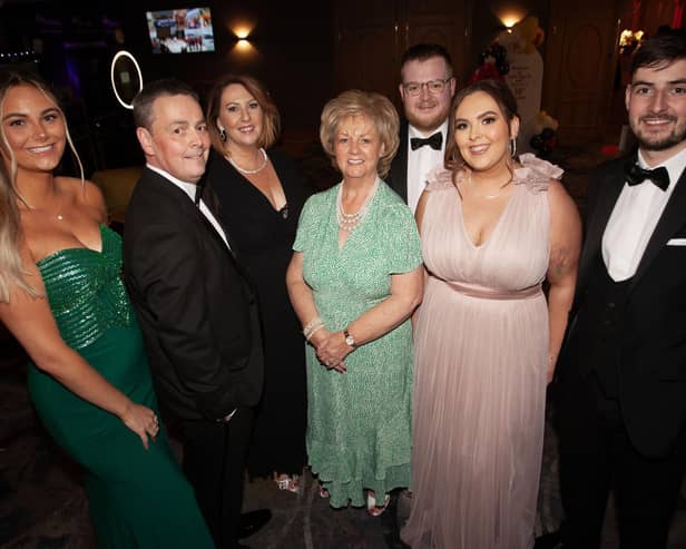 Stephen Twells, chair, Foyle Search and Rescue, pictured on Saturday night with members of his family at the Gala Ball.