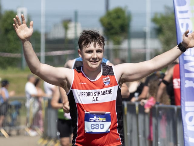 Harvey Mullen of Lifford Strabane AC is all smiles as he crossed the finish line at Melvin Running track.