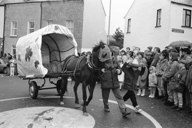 A horse and cart at the top of Main Street during the 1993 Buncrana St. Patrick's Day parade.