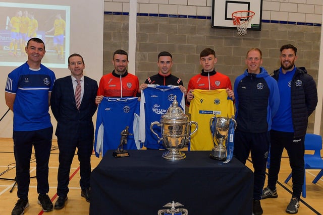 Derry City players Michael Duffy, Jordon McEneff  and  Liam Mullan pictured with St Columb's College PE staff Eamon Burns, Tyan Horner, James Green and Mark Scoltock during a visit to the school, with the FAI Cup on Monday. Photo: George Sweeney. DER2247GS - 19