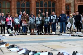 Families of victims of the troubles protest against the proposed Northern Ireland Troubles (Legacy and Reconciliation) Bill, at Guildhall Square in May.  Photo: George Sweeney.  DER222GS – 018