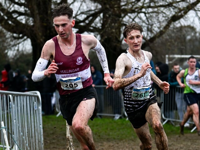 Cormac Dalton of Mullingar Harriers AC, Westmeath, left, and Nick Griggs of CNDR Track AC, Antrim, compete in the senior men's 7500m during the 123.ie National Cross Country Championships at Templemore Sports Complex in Derry. Photo by Ramsey Cardy/Sportsfile