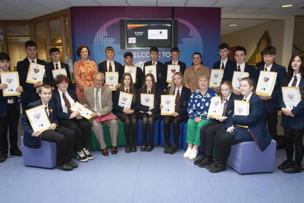MEE GRADUATIONS. . . . . Class 10B, pictured after receiving theri MEE Graduation awards at Oakgrove Integrated College on Tuesday morning last. Included are Mr. John Harkin, Principal, Marie Dunn, Resilio, and at back, Ms. Aislinn Breslin, and Mrs. Judith Colvin, MEE teachers. (Photos: Jim McCafferty Photography)