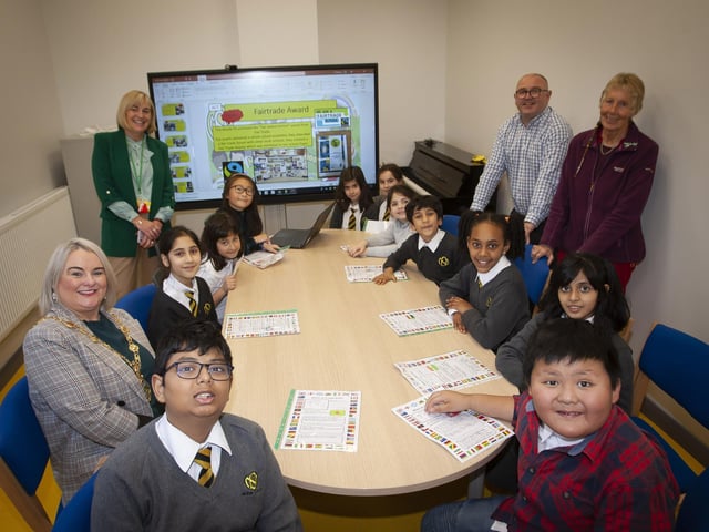 Children from P3 to P7 explaining to the Mayor, Sandra Duffy about where they come from at the Model Primary School this week. Included are Mrs. Michelle Ramsey, Principal, Mr. Michael Bradley, Vice Principal and Ms. Daisy Mules, Board of Governors. (Photos: Jim McCafferty Photography)
