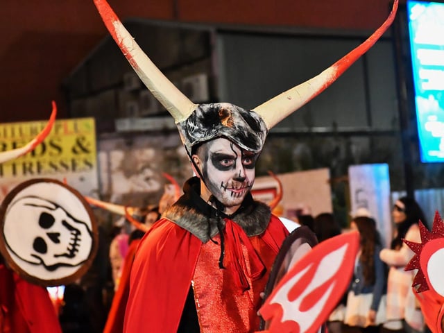 The ‘Carnival of the Dead’ Halloween parade makes its way along Strand Road. Photo: George Sweeney