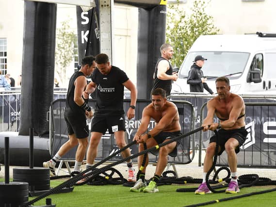 Shane O'Doherty, Daryl McDermott and Graham Doherty during the sled pull in the Ebrington Hyrox on Saturday morning. Photo: George Sweeney
