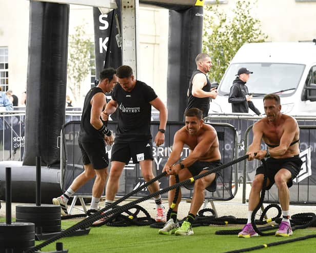 Shane O'Doherty, Daryl McDermott and Graham Doherty during the sled pull in the Ebrington Hyrox on Saturday morning. Photo: George Sweeney