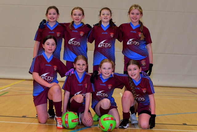 CHAMPIONS: St John’s P.S., winners of the Derry City Primary School Girls’ Indoor Gaelic Finals Day at the Foyle Arena on Friday afternoon. Photo: George Sweeney. DER2308GS –110