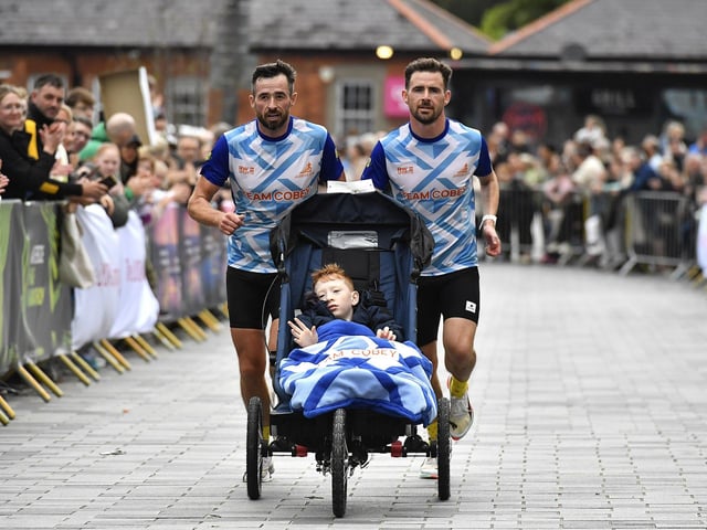 Team Cobey, finishes the 2025 Waterside Half Marathon. Photo: George Sweeney