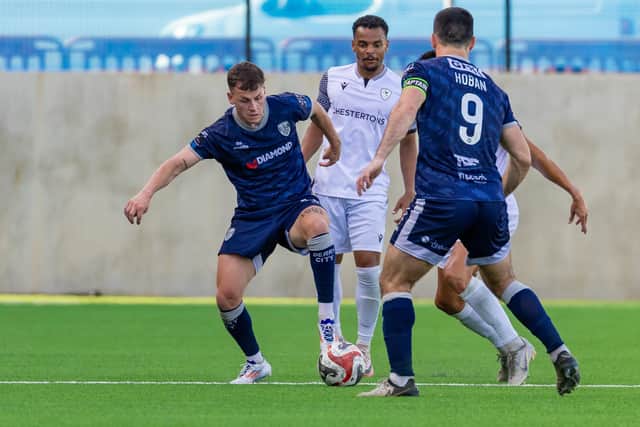 Derry City's Ben Doherty and Pat Hoban close down the Bruno's Magpies in Gibraltar. Photograph by Neil Wilson.