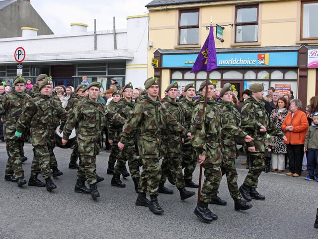 The local company of the FCA gave the salute at the main grandstand during the St. Patrick's Day Parade in Buncrana. 1903JM70