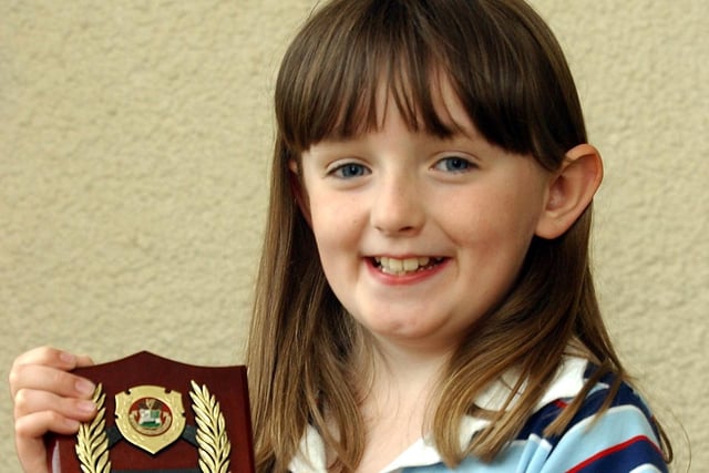 Niamh McCullough, from Moville, Lynch School, joint winner of the Girls Verse 8-10. (0605C35)