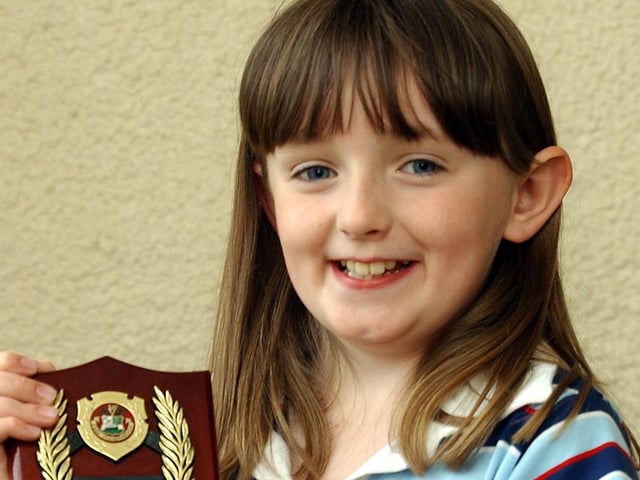 Niamh McCullough, from Moville, Lynch School, joint winner of the Girls Verse 8-10. (0605C35)