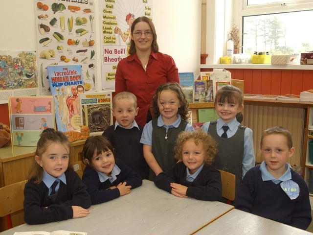P1 pupils at Glenmakee National School, from left, Emer McLaughlin, Chloe McGuinness, Conal McDaid, Rebecca Doherty, Ellen Owens, Charlotte Diver, and Aaron Lynch, with class teacher PAuline McLaughlin. (0509PG08):20 years on: Young people across Derry and Donegal starting school in September 2003