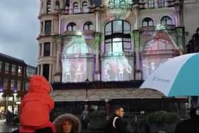 The dancing skeletons projected onto Austin's department store in Derry for Halloween.