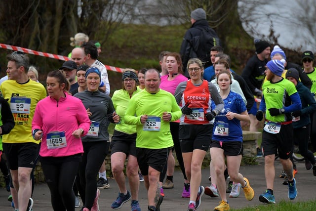 Runners make their way through St Columb’s Park during the Bentley Group Derry 10 Miler road race on Saturday morning. Photo: George Sweeney. DER2310GS – 107