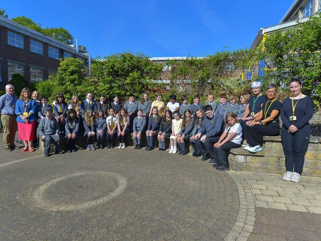 Mr Morrison's and Mrs M. Coyle's P7 class and support staff at the Model Primary School.