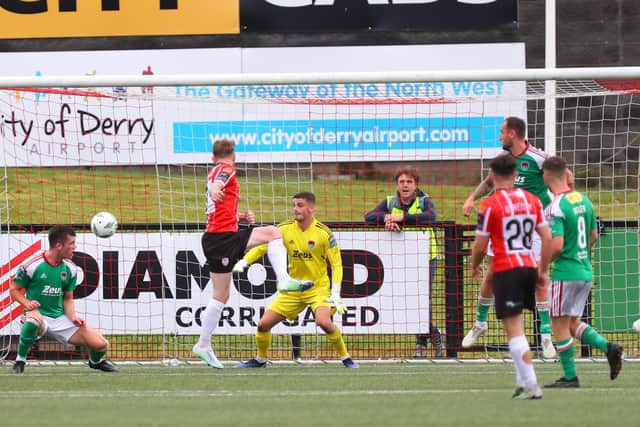 Jamie McGonigle guides the ball into the corner of the Cork City net. Photo by Kevin Moore.