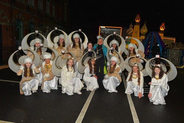 Mayor Sandra Duffy pictured with the Moon dancers, from Studio 2, at the Derry Christmas procession on Sunday evening last. Photo: George Sweeney. DER2248GS - 12