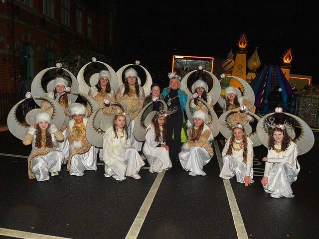 Mayor Sandra Duffy pictured with the Moon dancers, from Studio 2, at the Derry Christmas procession on Sunday evening last. Photo: George Sweeney. DER2248GS - 12