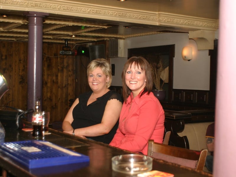 Patrons and staff at Downey's bar back in July 2004.
