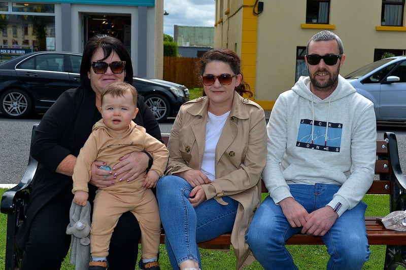 Marie McDaid with Rian, Sarah and Shane Toland at the Festival on the Green in Malin Town on Sunday afternoon last. Photo: George Sweeney. DER2331GS - 38