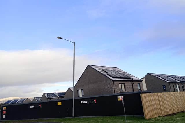 Solar panels on the new homes under construction in Derry.