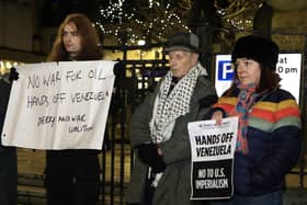 People taking part in the Derry Anti War Coalition Hands Off Venezuela rally held in the Diamond on Wednesday night. (Photo - Tom Heaney, nwpresspics)