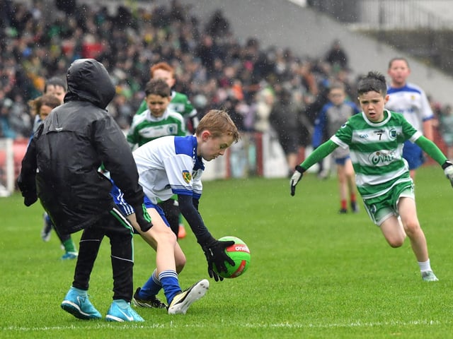 Young footballers from Faughanvale and Ballinderry playing during the SFC final interval at Celtic Park on Sunday afternoon. Photo: George Sweeney
