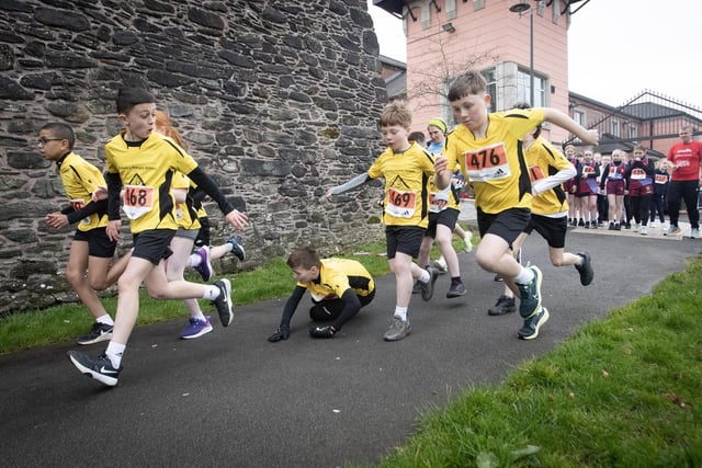 This young runners trips in the early stages of Tuesday's Feile Derry's Anthony Hegarty 1km race but recovers to finish well. (Photos: Jim McCafferty Photography)