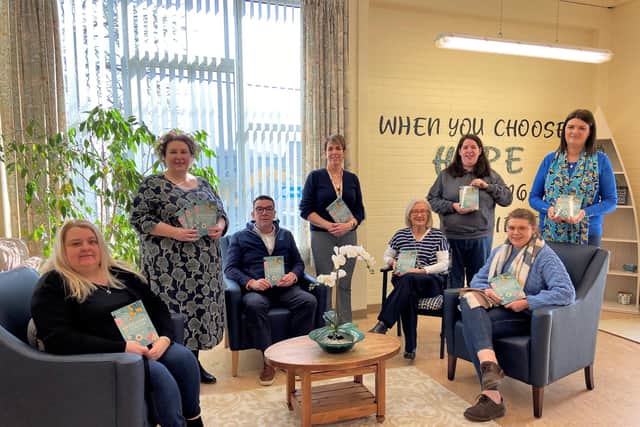 Launching the Western Trust Recovery College Spring 2023 Prospectus from left to right are: Sharon Vaughan, Peer Volunteer; Bernadette Donaghy; Lead Peer Educator; Mark Hunter, Respite Team Manager; Pauline Travers, Primary Care Liaison Service; Yvonne Cairns, Recovery College Coordinator; Melanie Patrick, Peer Volunteer; Brona Dyson, Mental Health Nurse and Simone McAleer, Peer Volunteer.