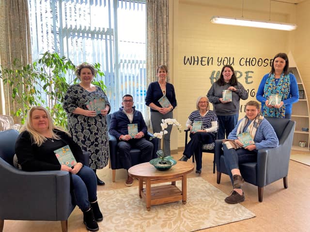 Launching the Western Trust Recovery College Spring 2023 Prospectus from left to right are: Sharon Vaughan, Peer Volunteer; Bernadette Donaghy; Lead Peer Educator; Mark Hunter, Respite Team Manager; Pauline Travers, Primary Care Liaison Service; Yvonne Cairns, Recovery College Coordinator; Melanie Patrick, Peer Volunteer; Brona Dyson, Mental Health Nurse and Simone McAleer, Peer Volunteer.