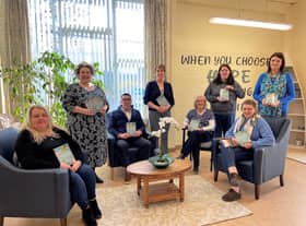Launching the Western Trust Recovery College Spring 2023 Prospectus from left to right are: Sharon Vaughan, Peer Volunteer; Bernadette Donaghy; Lead Peer Educator; Mark Hunter, Respite Team Manager; Pauline Travers, Primary Care Liaison Service; Yvonne Cairns, Recovery College Coordinator; Melanie Patrick, Peer Volunteer; Brona Dyson, Mental Health Nurse and Simone McAleer, Peer Volunteer.