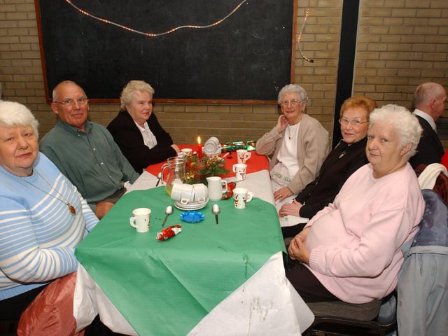 From left, Peggy Maguire, Wilf Abel, Mary Abel, Nan Quigley, Kathleen Cairns, and Brenda Harkin. (0912PG19) :Christmas parties for Derry's senior citizens in December 2003