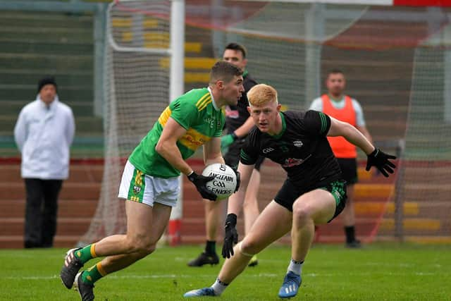 Ciaran McFaul of Glen evades a tackle from Cargin’s Pat Shivers. Photo: George Sweeney