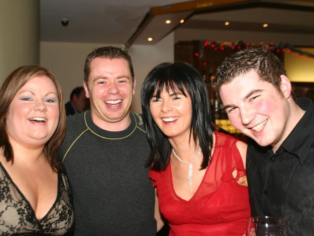 Sharing a joke at the Christmas party in the City Hotel at the Christmas party. 1870/dd : Christmas and New Year Parties 2006.