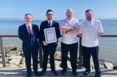 Left to right: Owen McGee General Manager, Restaurant Manager Keith McGilloway (holding winning cert), Executive Head Chef Gordon Smyth, and Head Chef Conor McCormick.