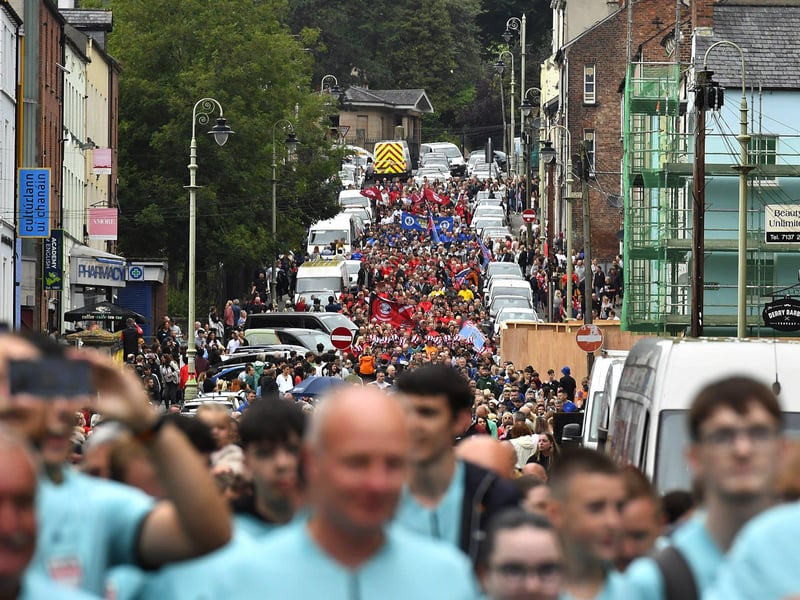 The Foyle Cup teams parade down Great James Street towards the Guildhall Square. Photo: George Sweeney